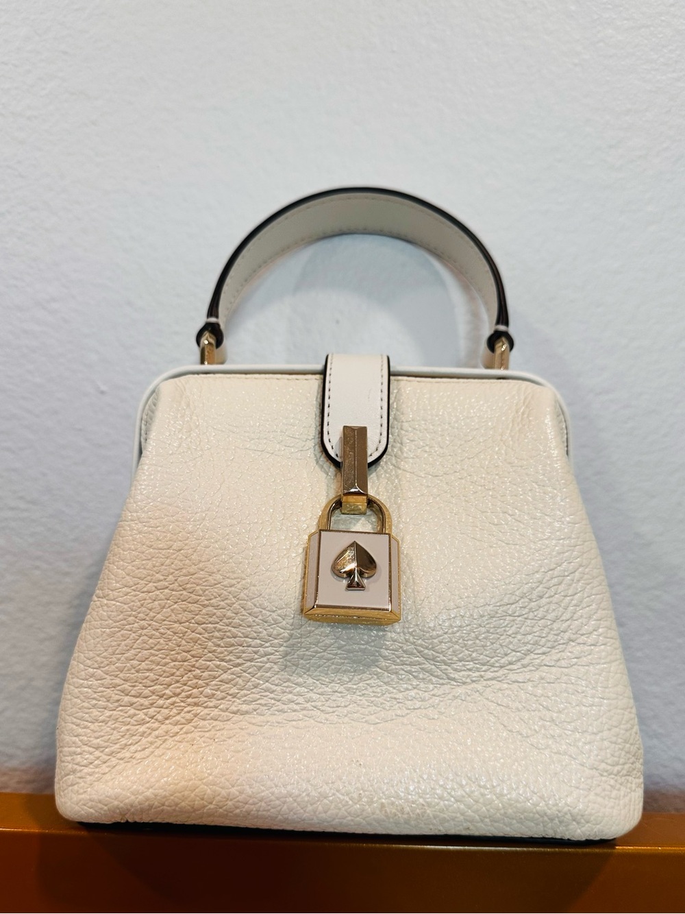 Kate Spade White Pebbled Leather Top-Handle Bag with Spade Lock